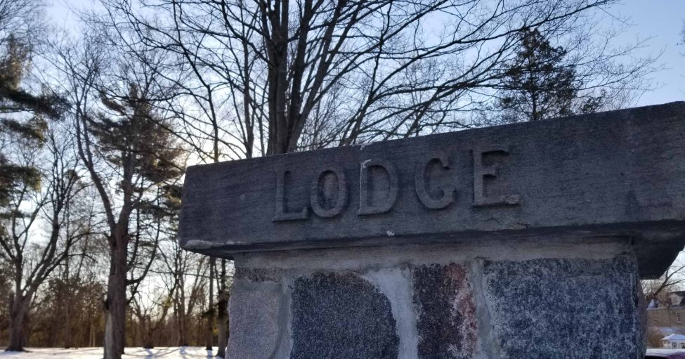 GL stone post w LODGE sign